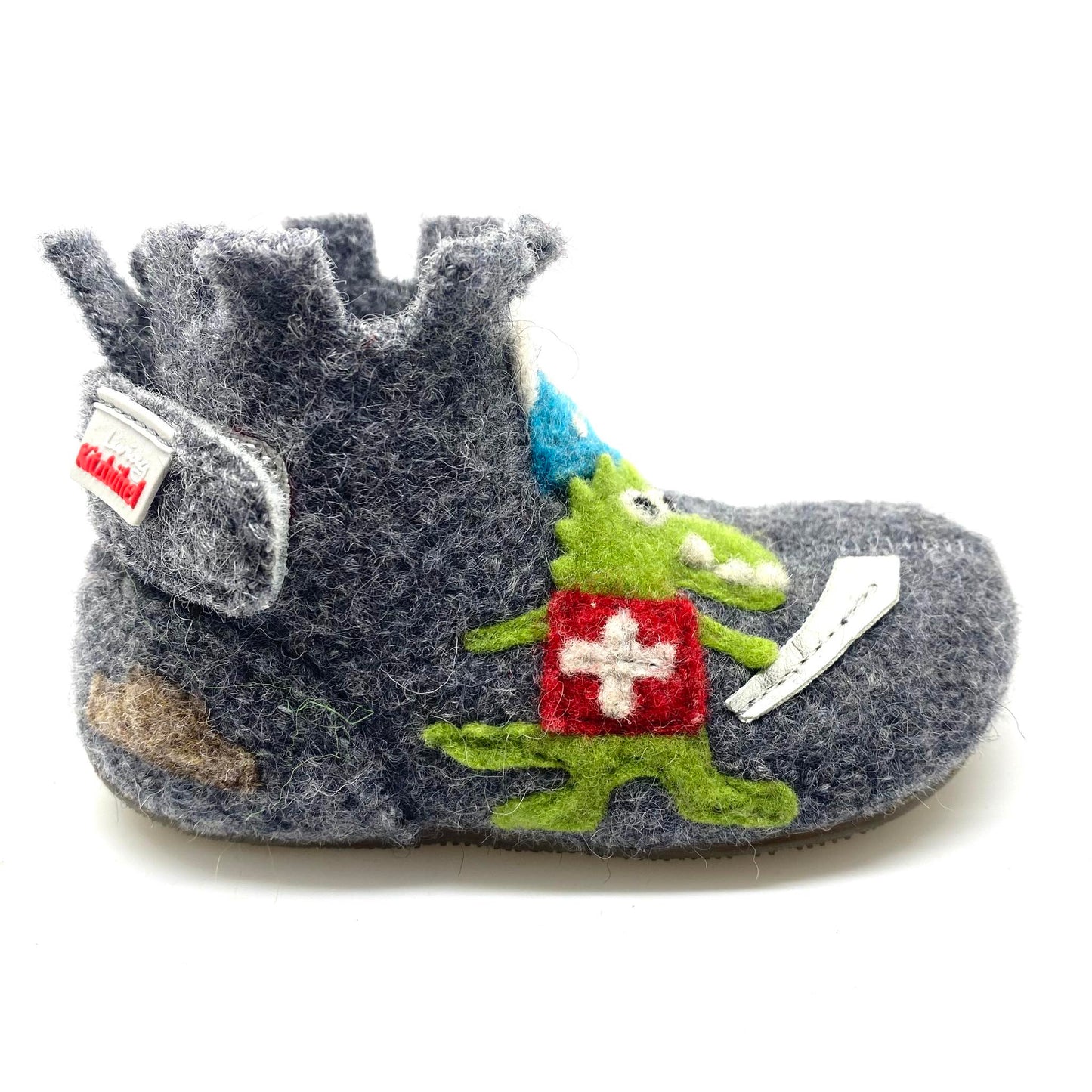 Kitzbühel pantoffel hoog met draak en kasteel winter