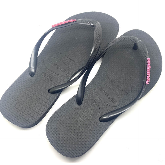 Havaianas zwart met roze letters