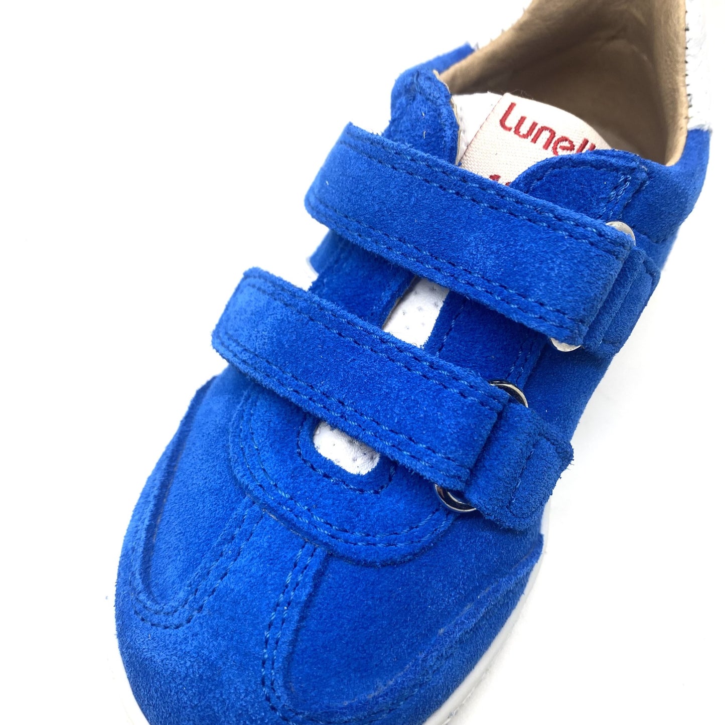 Lunella lage sneaker fel blauw met velcro.