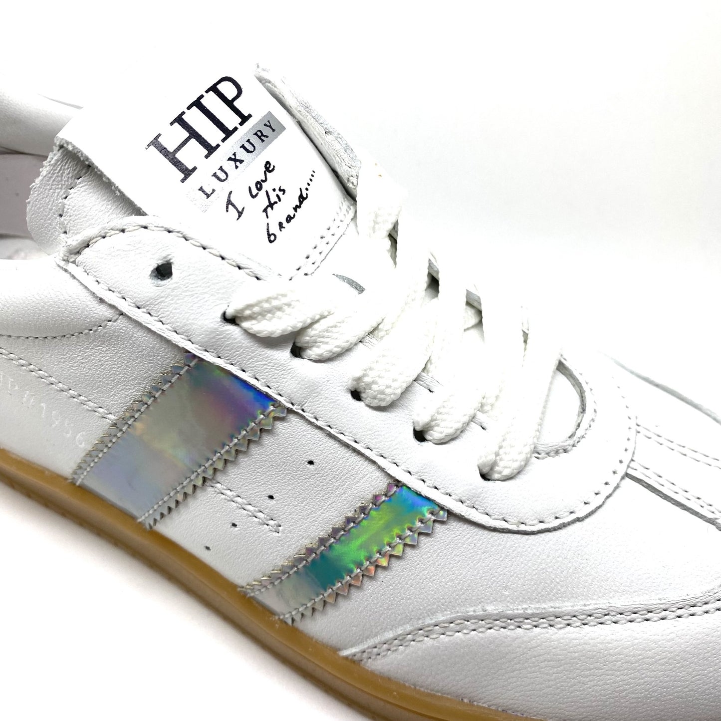 Hip lage witte sneaker met zilver